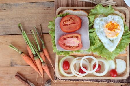 Slice bread ,ham ,fried eggs with breakfastの写真素材