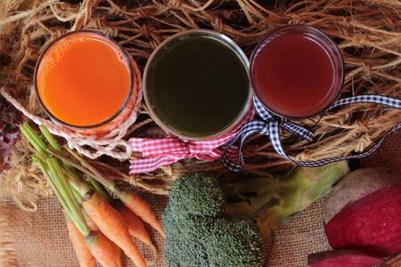 Smoothies mixed vegetables, beetroot, carrot and green vegetablesの写真素材
