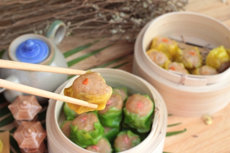 Chinese steamed dumpling and hot tea deliciousの写真素材