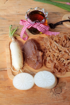 Fresh radish and pickled radish for cookingの写真素材