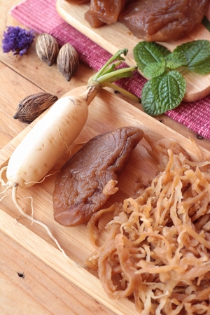 Fresh radish and pickled radish for cookingの写真素材