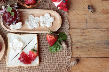 Fresh strawberries red and jam with breadの写真素材