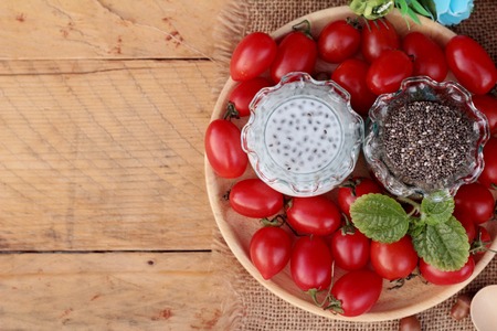 Chia seeds with milk and tomato deliciousの写真素材