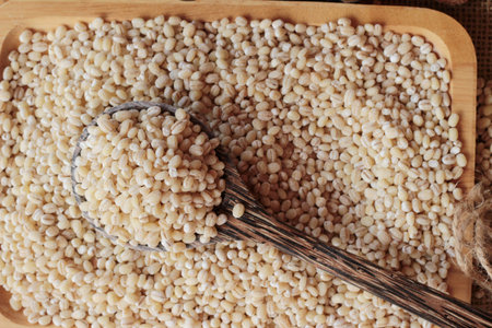 raw the barley on wood backgroundの写真素材