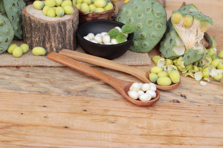 Lotus seeds in nature on wood backgroundの写真素材