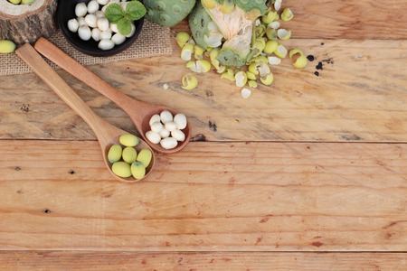 Lotus seeds in nature on wood backgroundの写真素材