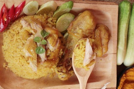 Chicken biryani with rice delicious and sauceの写真素材