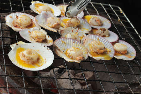 Scallops grilled butter and cheese is deliciousの写真素材