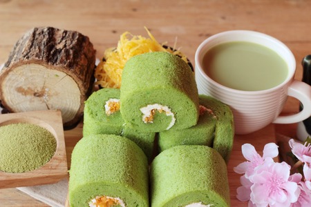Green tea cake roll and matcha green teaの写真素材