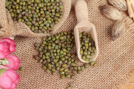 Green beans dry on wood background