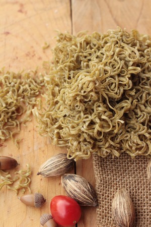 Dry instant vegetable noodle on wood backgroundの写真素材