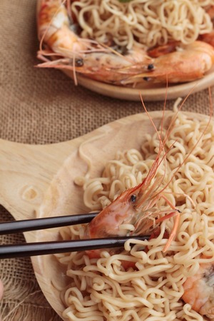 Instant noodle and shrimp baked is deliciousの写真素材