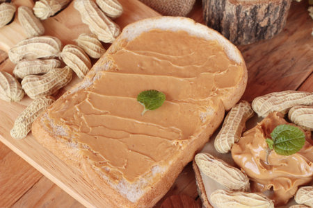 Peanut butter smeared on bread is delicious