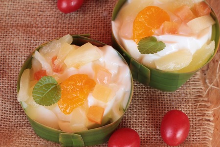 mix fruit salad topping on tofu milkの写真素材