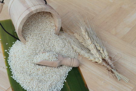 Sesame seeds for health on wood background