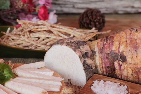 Fresh taro and taro stick with saltの写真素材