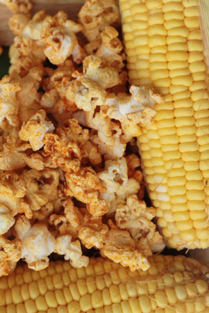 Popcorn with butter and fresh corn cob