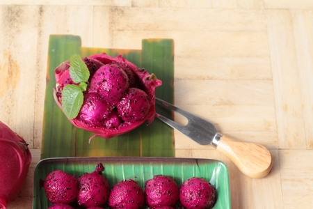 Fresh dragon fruit organic with scoop spheresの写真素材