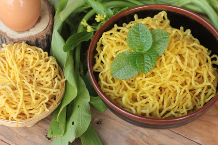 Egg noodles and raw noodles for cookingの写真素材