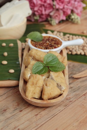 Fried tofu, chinese vegetarian food with sauceの写真素材
