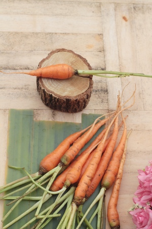 fresh carrot vegetables organic on wood backgroundの写真素材