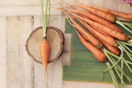 fresh carrot vegetables organic on wood background