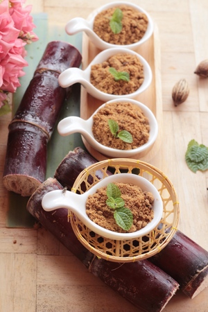 Brown sugar with natural sweet and caneの写真素材