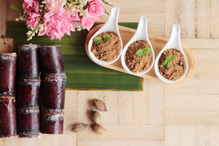 Brown sugar with natural sweet and caneの写真素材