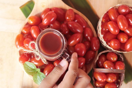 Tomato juice and pear cherry tomatoesの写真素材