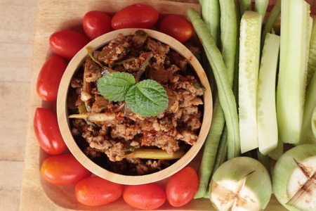 Spicy pork pastes delicious with fresh vegetablesの写真素材