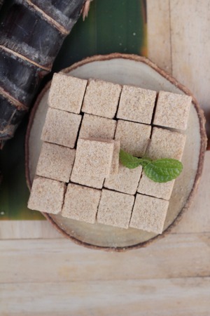 Brown sugar cubes is organic and caneの写真素材