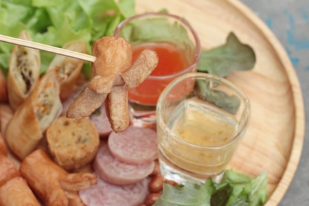 Appetizer sausages with fried spring rolls delicious.の写真素材