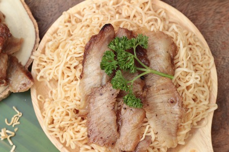 Instant noodles at blanched with baked pork deliciousの写真素材
