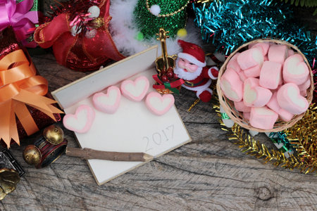 Celebrate Christmas decoration with pink heart marshmallow