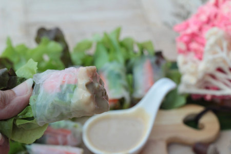 Fresh vegetable salad roll with salad dressing