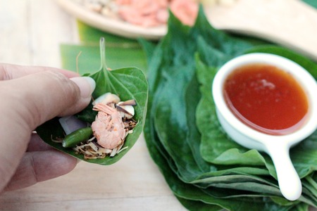 Miang Kham -  leaf wrap appetizer is deliciousの写真素材