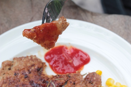 Grilled pork steak with  bread and ketchupの写真素材