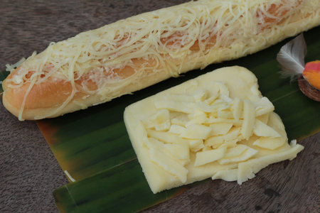 Baked bread sprinkle mozarella cheese is delicious