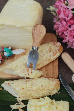 Baked bread sprinkle mozarella cheese is delicious