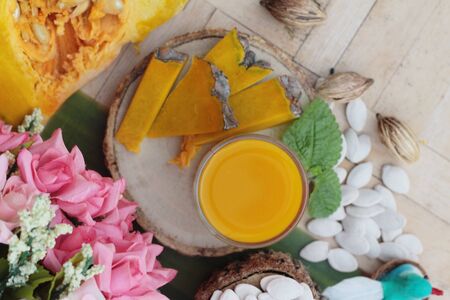 Fresh pumpkin smoothie in glass is deliciousの写真素材