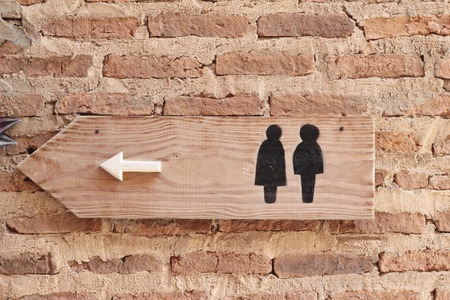 Symbolize arrow pointing go to way toiletの写真素材