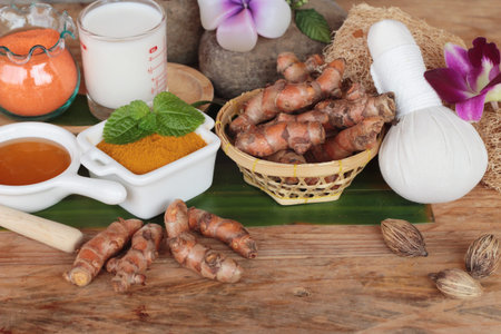 Turmeric powder with honey ,milk, salt for scrub