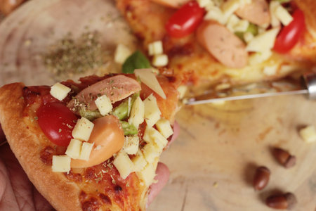 Italian pizza is delicious on wood backgroundの写真素材