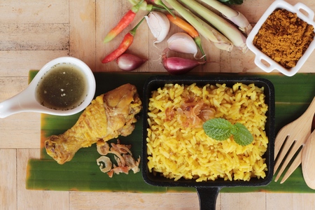 chicken biryani with rice delicious and sauceの写真素材