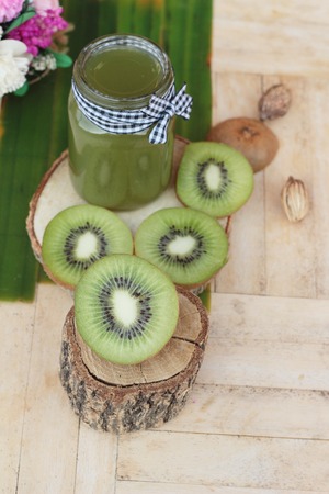Kiwi juice and fresh kiwi slice is deliciousの写真素材
