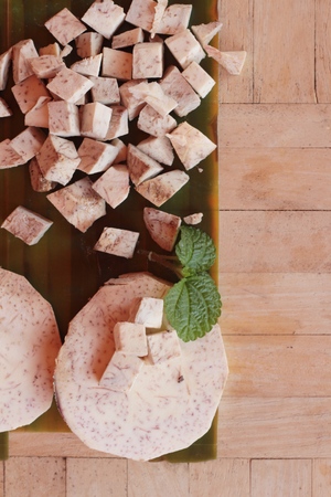 Taro root and taro cut small piecesの写真素材