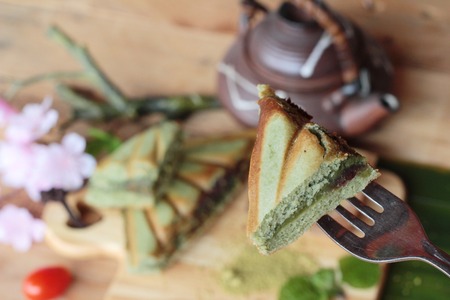 Green tea cake sandwich and green tea powderの写真素材