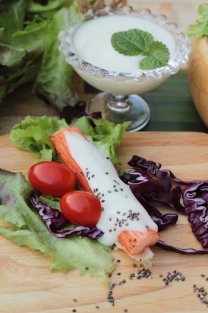 Salad of fresh vegetables with dressing deliciousの写真素材