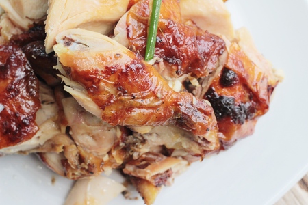 Roast chicken cut is delicious in plateの写真素材