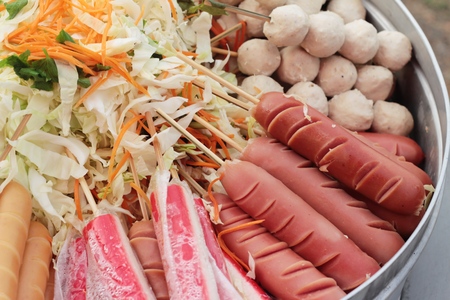 Meatballs and sausages steamed in the marketの写真素材